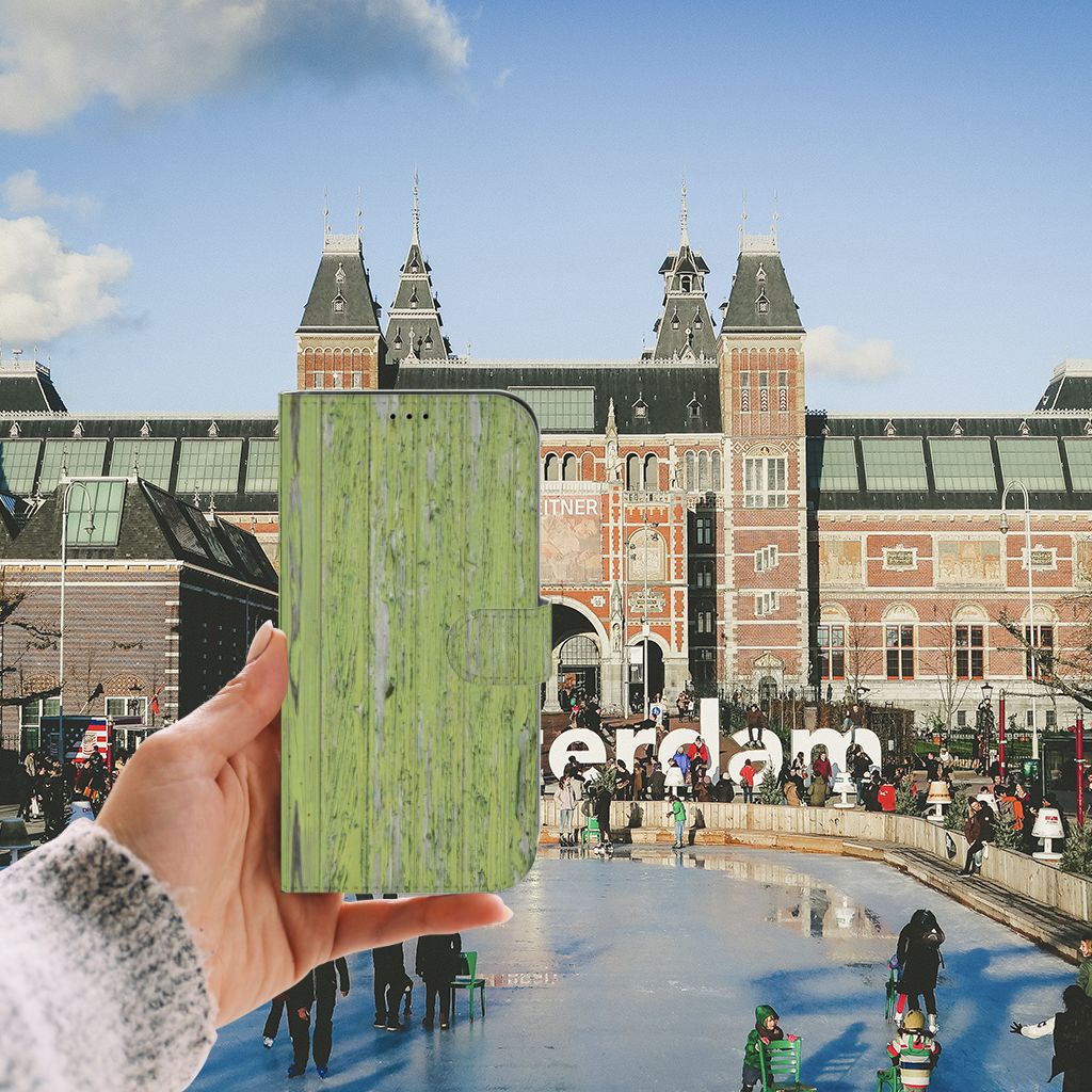 iPhone 13 Pro Max Book Style Case Green Wood in front of the Rijksmuseum, Amsterdam.