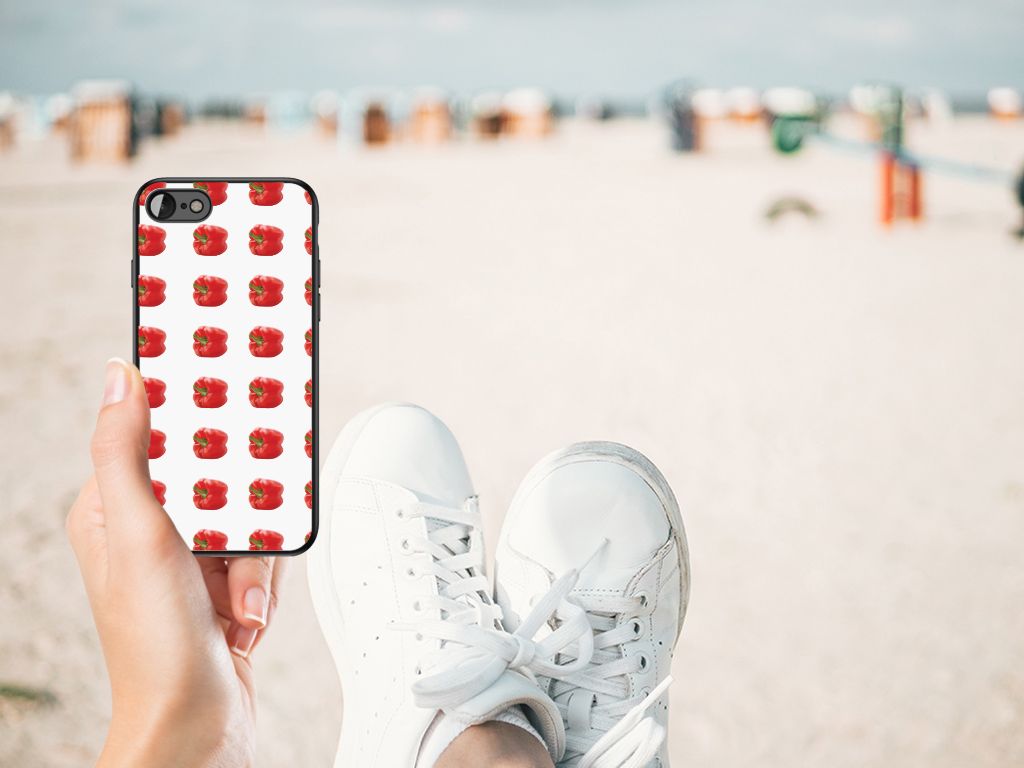 iPhone SE 2022 | SE 2020 | 7/8 Back Cover Hoesje Paprika Red on a beach with white sneakers in the foreground.