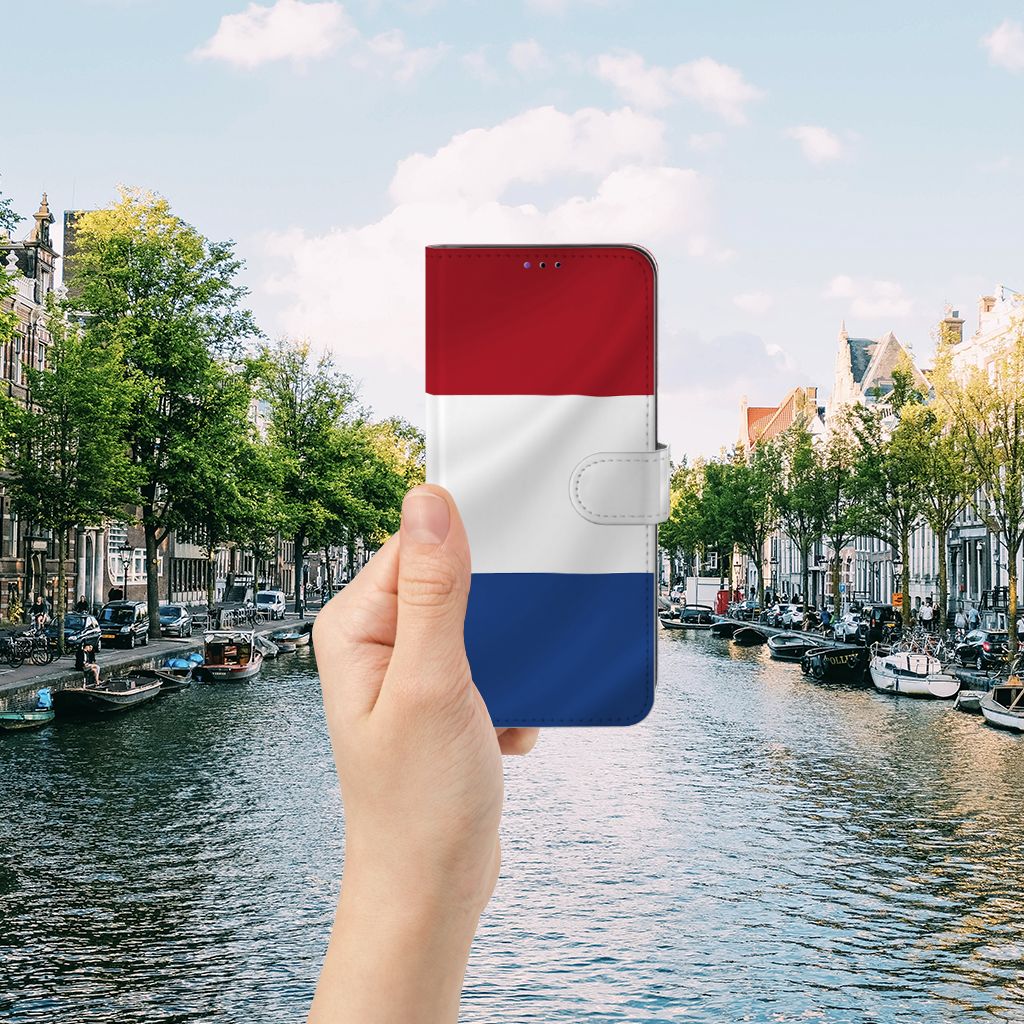 Samsung Galaxy A22 5G Bookstyle Case Nederlandse Vlag in hand near canal.