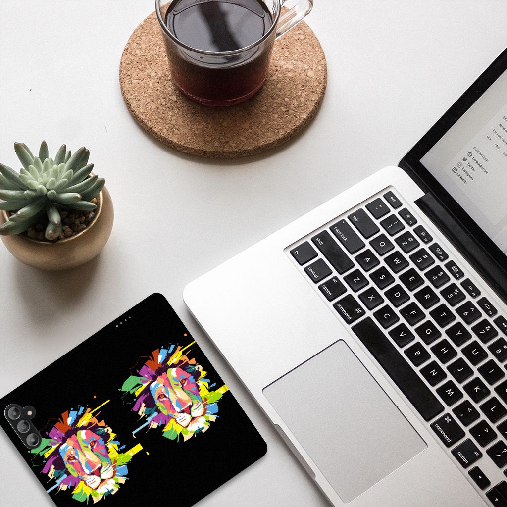 Samsung Galaxy A14 5G Magnet Case Lion Color displayed on a desk with a laptop and coffee cup.