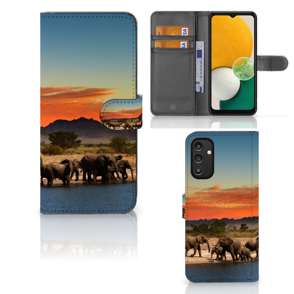 Samsung Galaxy A14 4G Telefoonhoesje met Pasjes Olifanten met olifanten bij water en een kleurrijke lucht.
