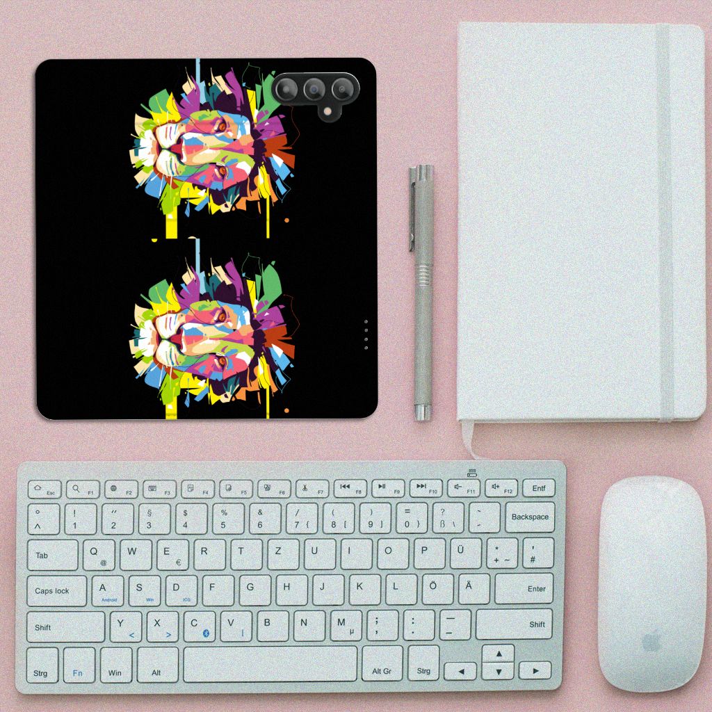 Samsung Galaxy A14 4G Magnet Case Lion Color design displayed on a desk with keyboard and notebook.