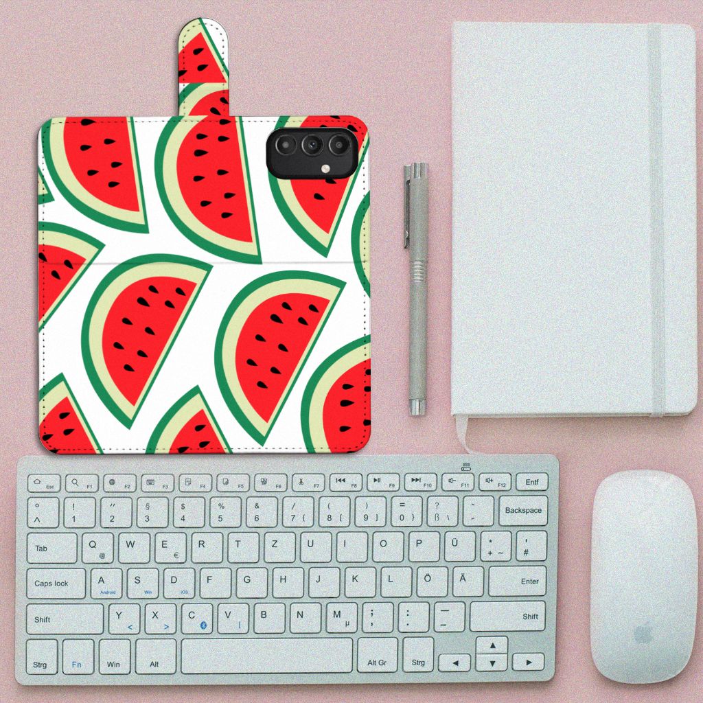 Samsung Galaxy A14 4G Book Cover Watermelons displayed on a desk with a keyboard and notebook.