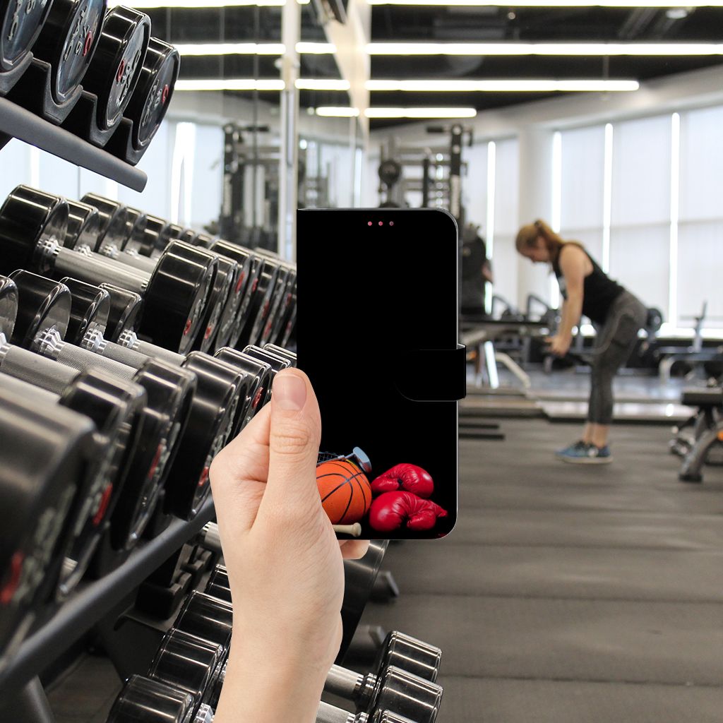 OPPO A54 5G | A74 5G | A93 5G Wallet Case met Pasjes Sports displayed in gym with weights and sports equipment.
