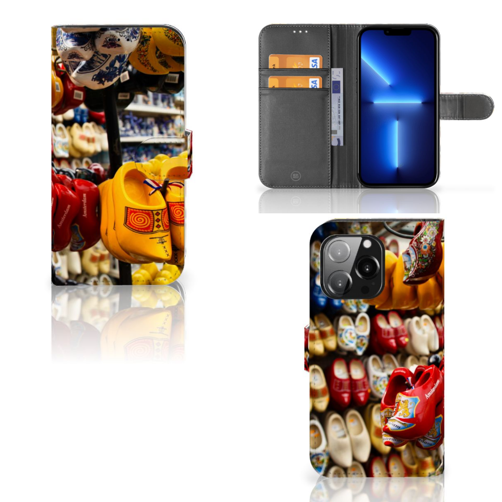 iPhone 13 Pro Flip Cover Klompen met kleurrijke klompen in een sfeervolle setting. 🥿