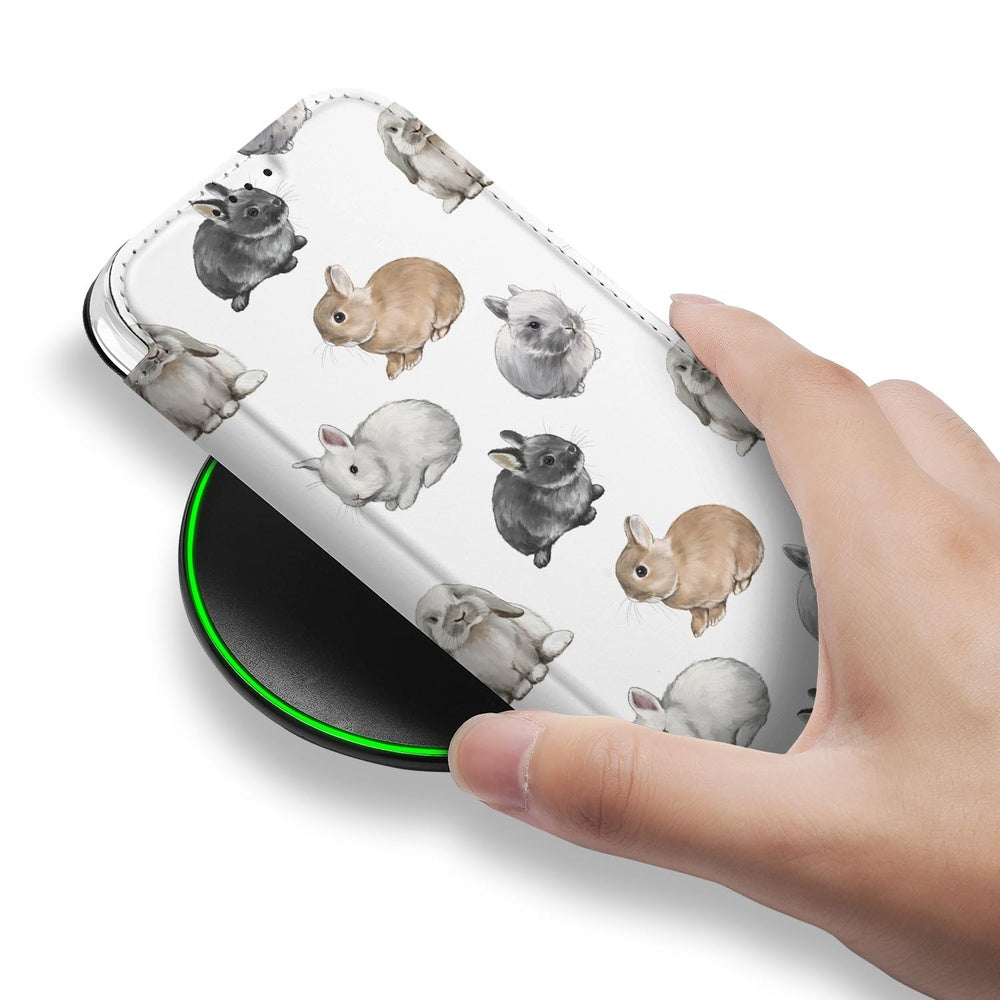 Book Case Apple iPhone 17 Pro Konijntjes konijntjes design detail hand in gebruik