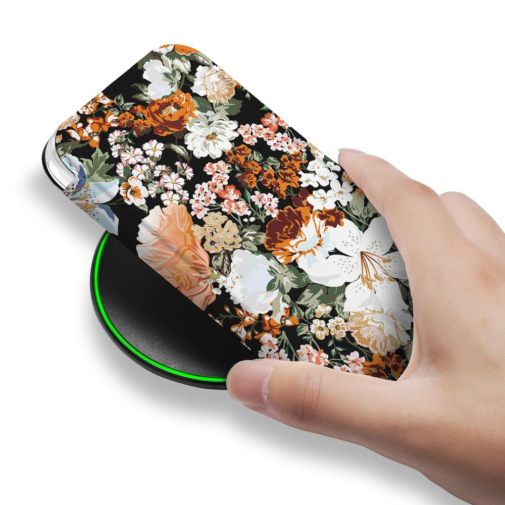 Apple iPhone Air Flip Style Cover Dark Flowers design hand bij draadloze oplader