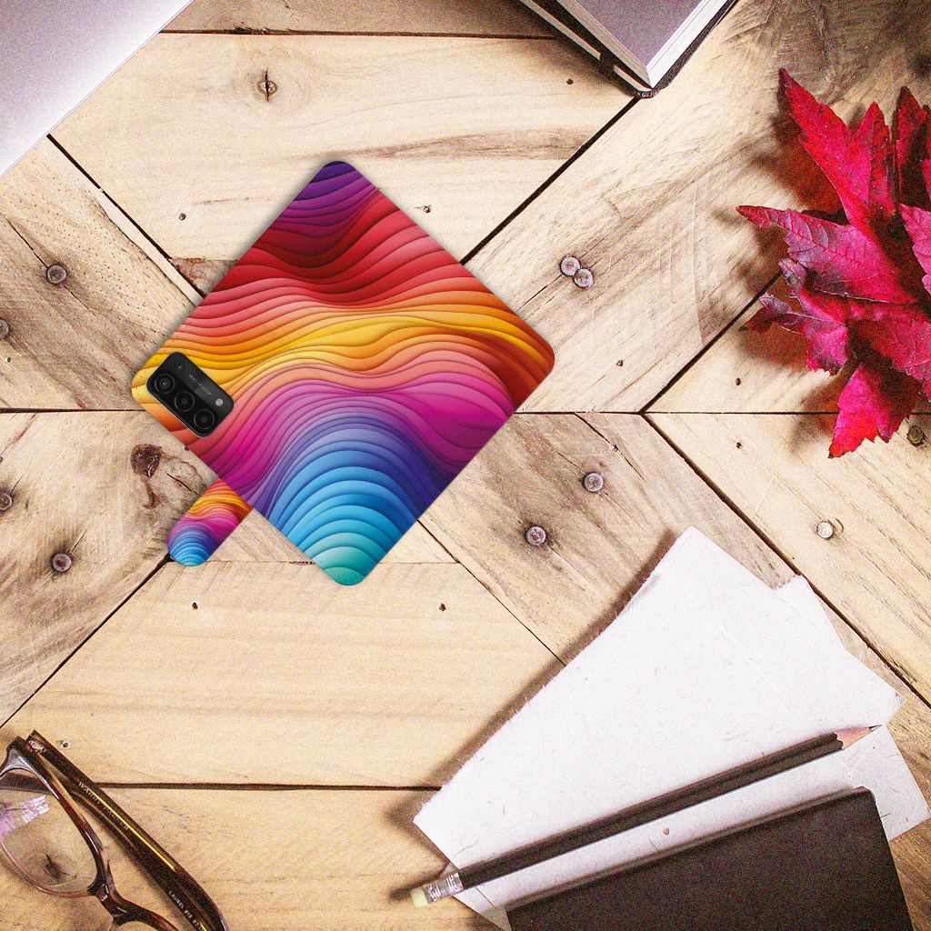 Book Case voor OPPO A54 5G | A74 5G | A93 5G Regenboog met kleurrijke golven op houten tafel.