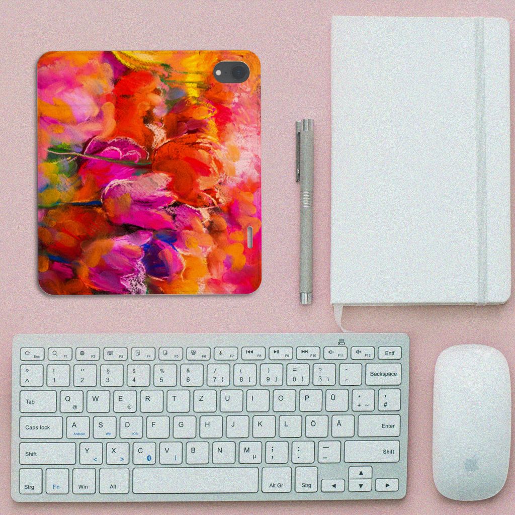 Bookcase Apple iPhone Xr Tulips design with vibrant colors, next to office supplies and a keyboard.