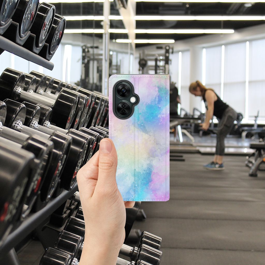 Bookcase OnePlus Nord CE 3 Lite Watercolor Light in hand at gym, perfect gift for style and protection 💖.