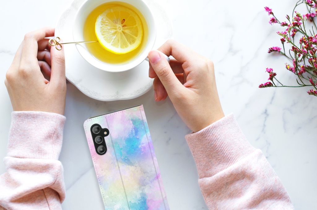 Bookcase Samsung Galaxy A14 4G Watercolor Light design next to a cup of lemon tea and flowers.