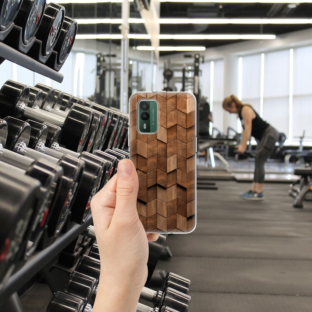 Nokia XR21 Bumper Hoesje voor Nokia XR21 Wooden Cubes hand met hoesje in sportschool