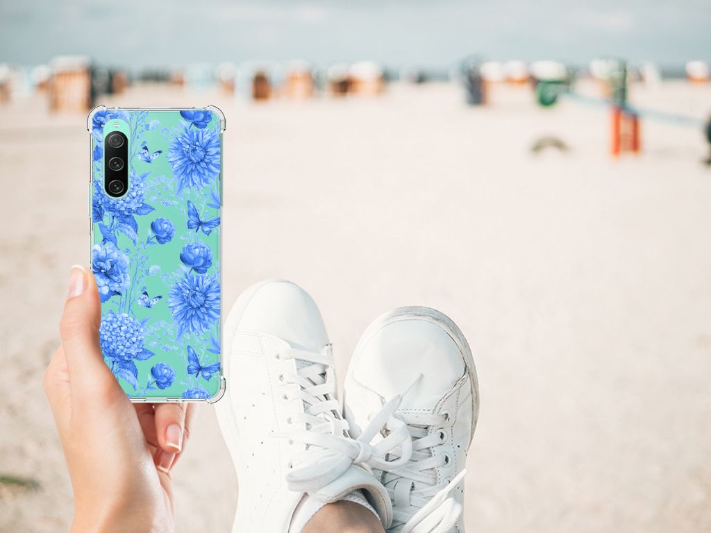 Sony Xperia 10 V Case voor Sony Xperia 10 V Flowers Blue handen bloemen strand