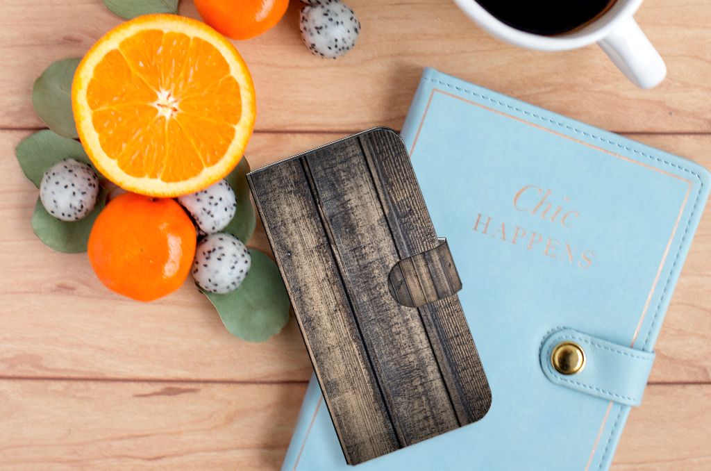 Google Pixel 6A Book Style Case Steigerhout met oranje vruchten en notitieboek op houten tafel.