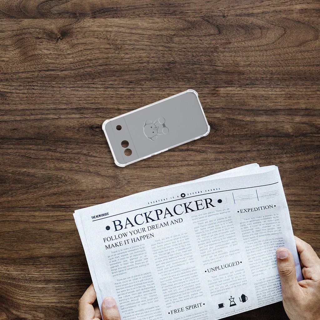 Google Pixel 8A Stevig Bumper Hoesje Grijs Baby Olifant achteraanzicht op tafel met krant