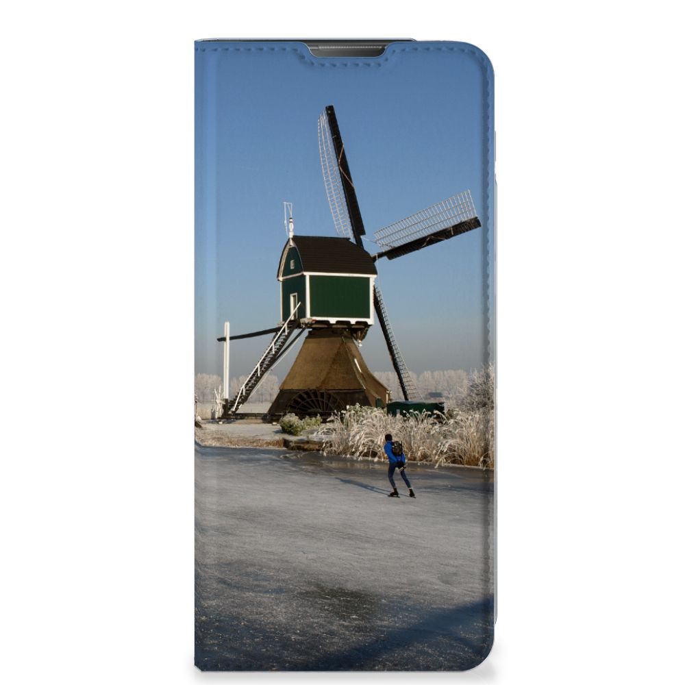 Motorola Moto E20 Book Cover Schaatsers schaatsen windmill gezien aanzicht
