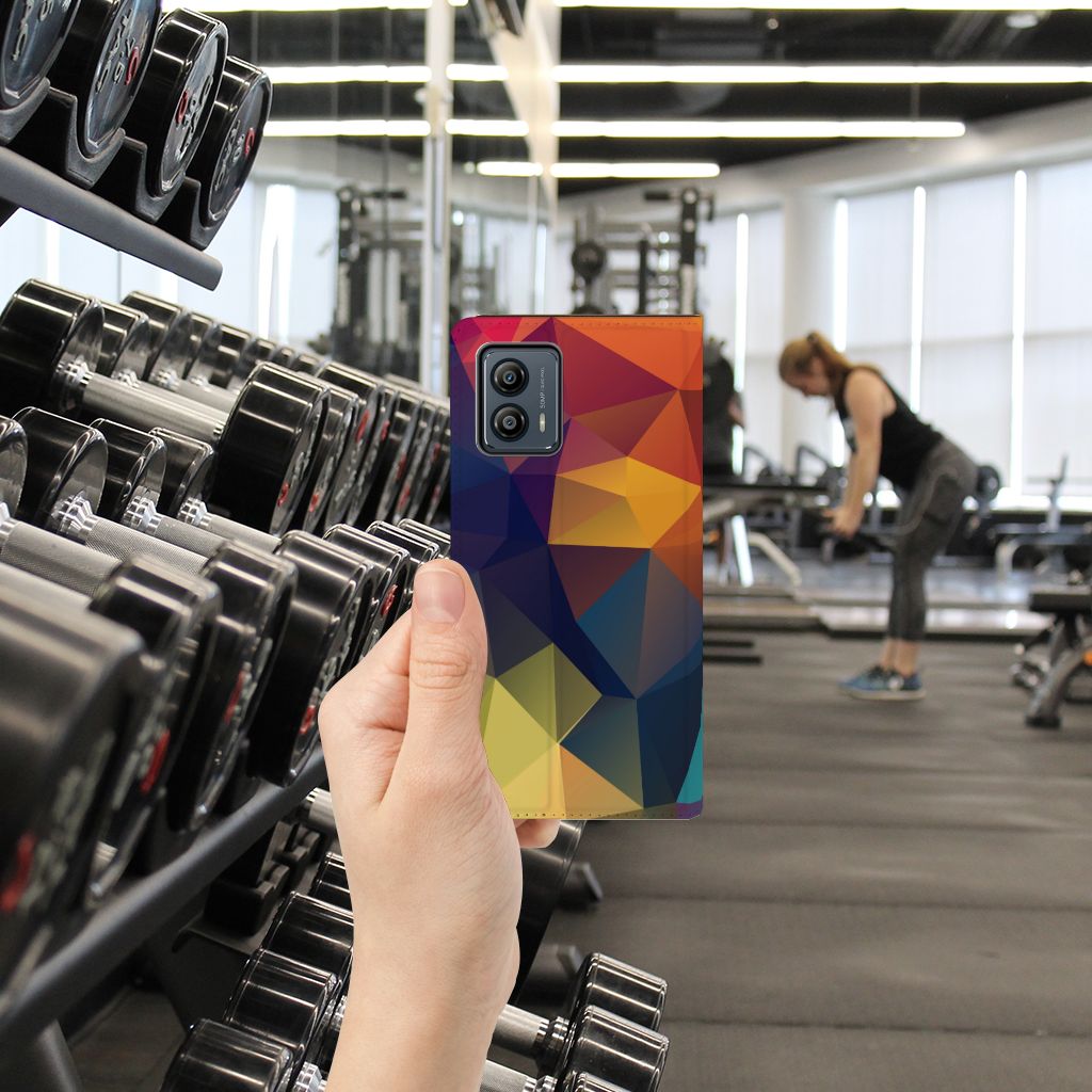 Motorola Moto G53 Stand Case Polygon Color hands holding colorful geometric design gym setting