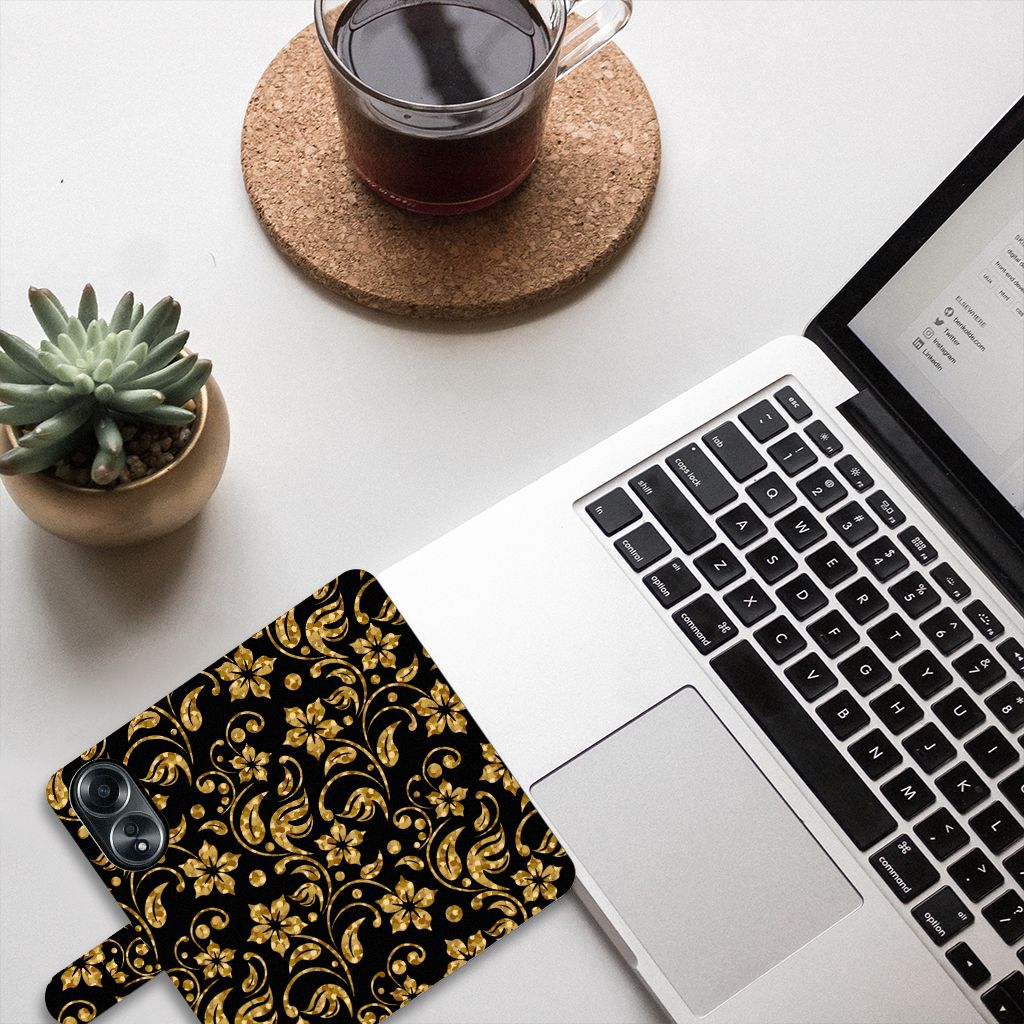 OPPO A58 4G Hoesje Gouden Bloemen naast een laptop met een mooie achtergrond. Geschikt als cadeau voor elke gelegenheid!