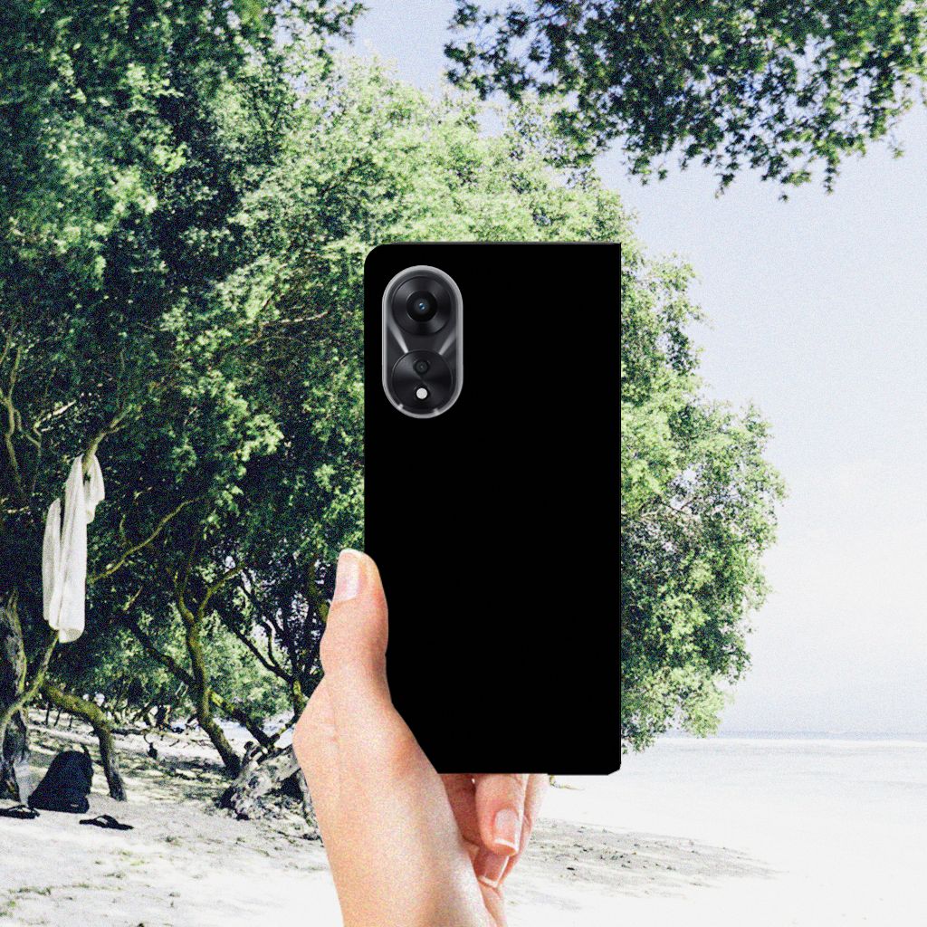 OPPO A78 | A58 5G Magnet Case Cow in hand against a scenic beach background, showcasing durability and style.