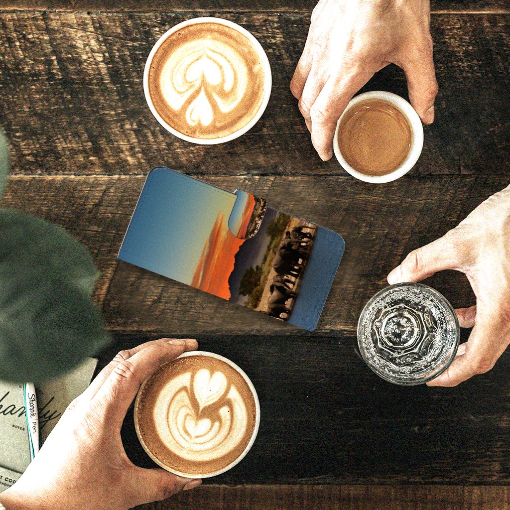 OPPO Find X6 Telefoonhoesje met Pasjes Olifanten design olifanten aanzicht tafel koffie