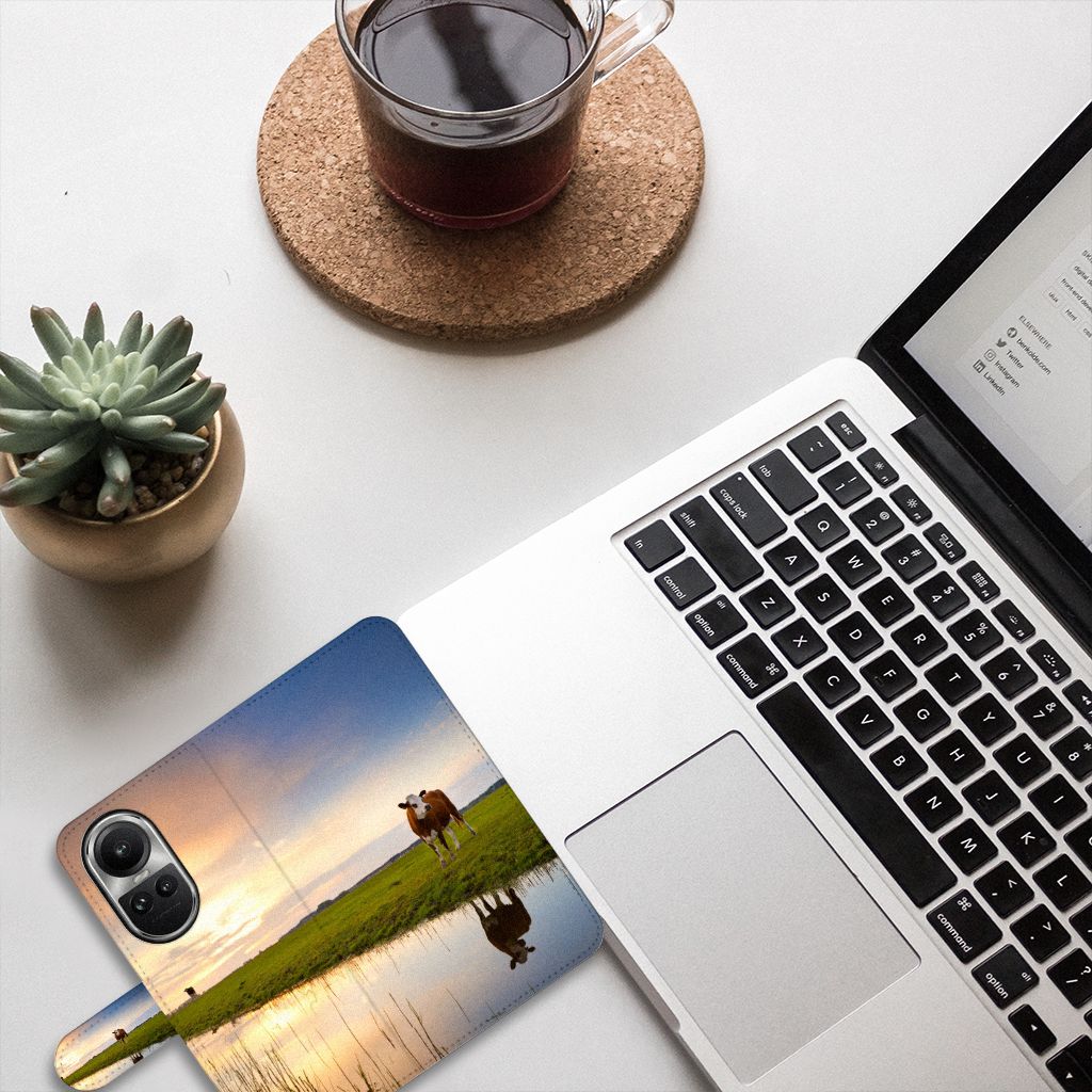 OPPO Reno10 | 10 Pro Telefoonhoesje met Pasjes Koe natuur koeiendecor landschap aanzicht