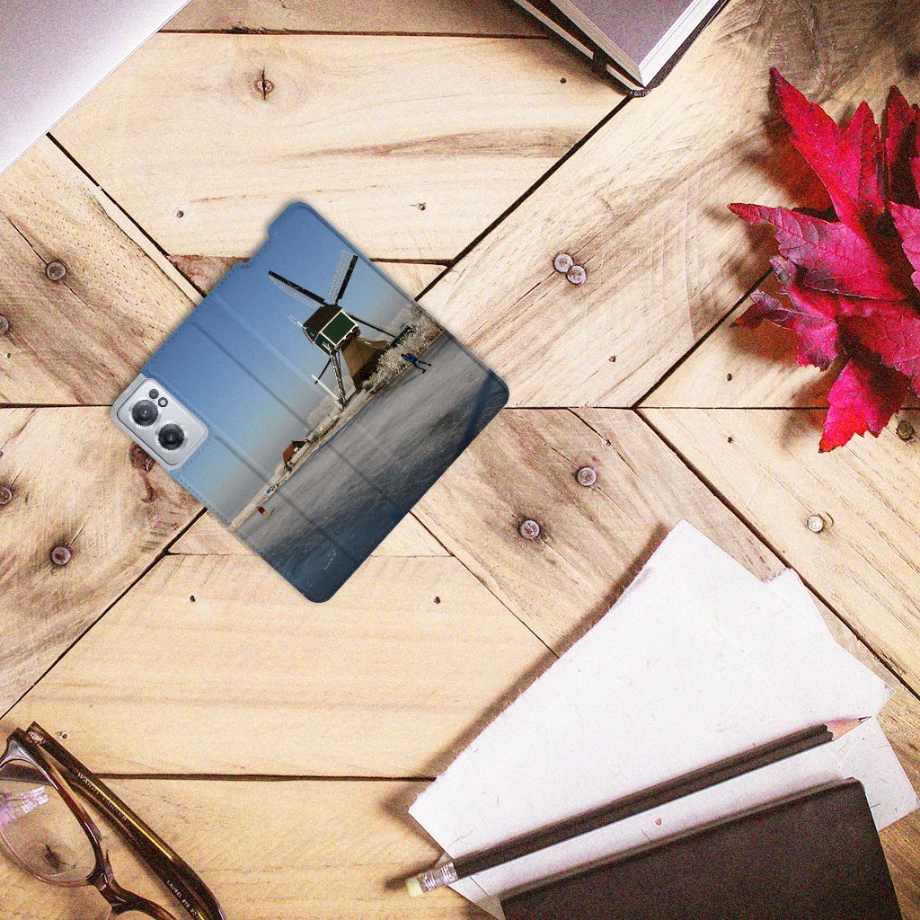 OnePlus Nord CE 2 5G Book Cover Schaatsers schaatsen Nederlandse windmill design vooraanzicht