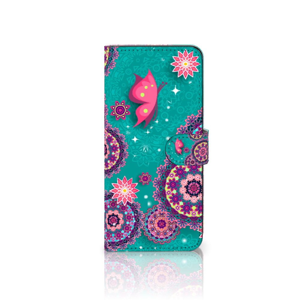 Samsung Galaxy A14 4G Hoesje Cirkels en Vlinders met kleurige mandala's en vlinders op een turquoise achtergrond.