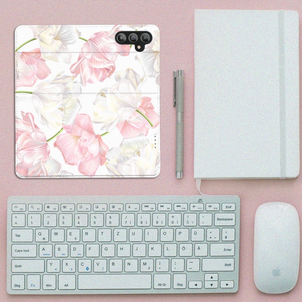 Samsung Galaxy A14 4G Smart Cover Lovely Flowers on a desk with keyboard, notebook, and pen.