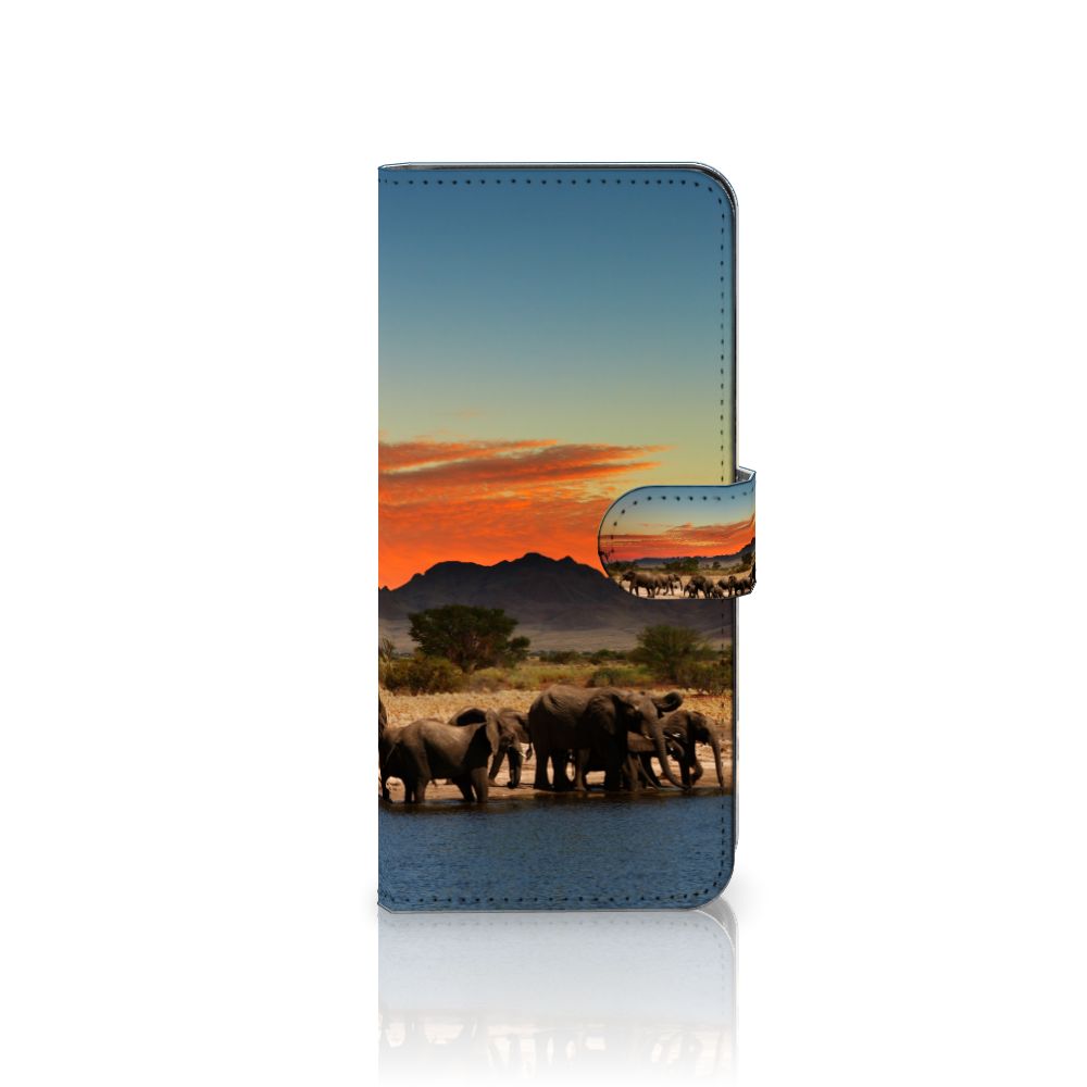 Samsung Galaxy A14 4G Telefoonhoesje met Pasjes Olifanten met olifanten onder een rode lucht bij water.