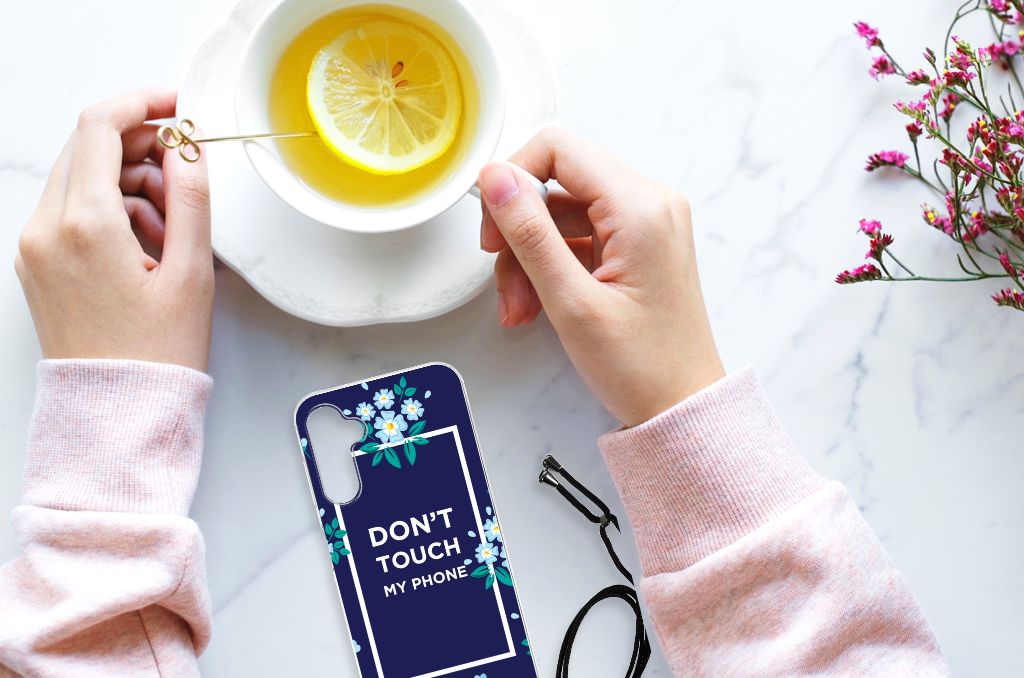 Samsung Galaxy A14 5G Anti Shock Case Flowers Blue DTMP with floral design and a cup of tea on a table.