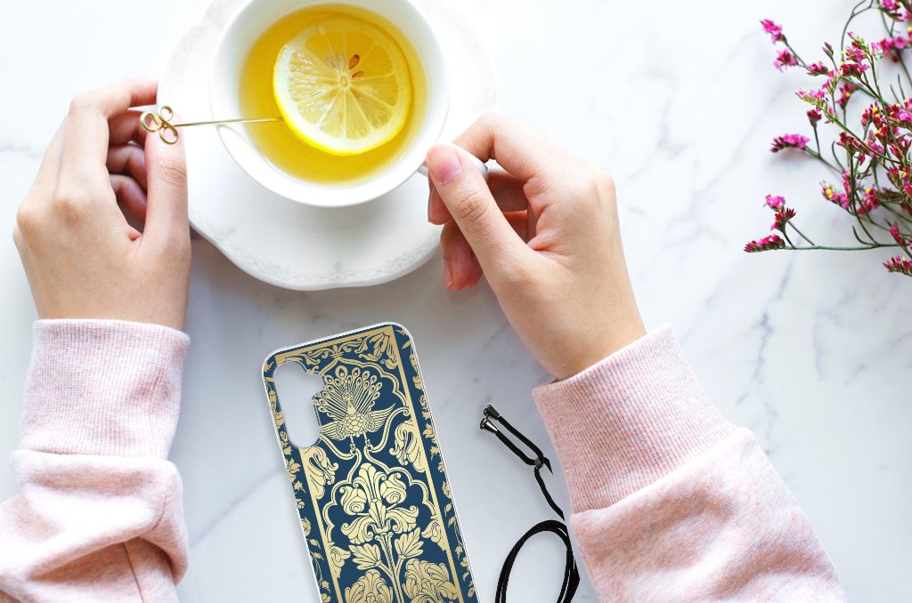 Samsung Galaxy A14 5G Case Beige Flowers design displayed with tea and lemon on a table.