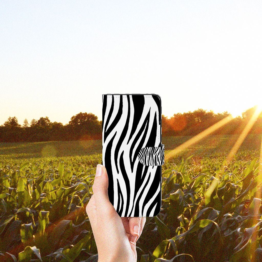 Samsung Galaxy M53 Telefoonhoesje met Pasjes Zebra zebraprint hand natuur