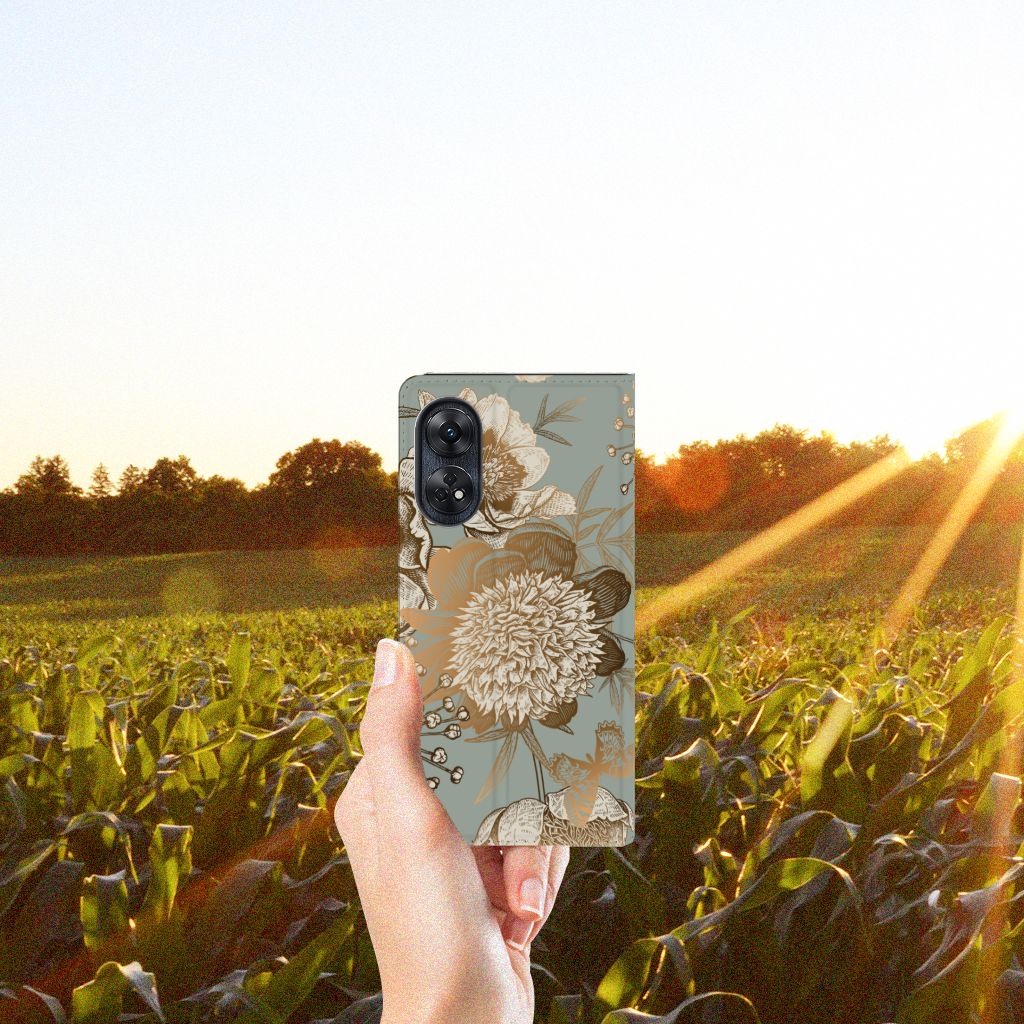 Smart Cover voor OPPO Reno8 T 4G Vintage Bird Flowers in een hand, omringd door een zonovergoten veld.