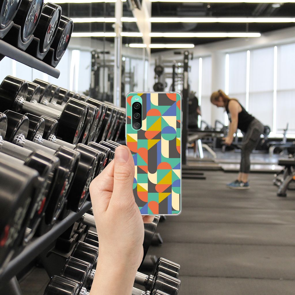 Sony Xperia 10 V TPU bumper Funky Retro in hand at the gym, showcasing vibrant design perfect as a gift 🎁.