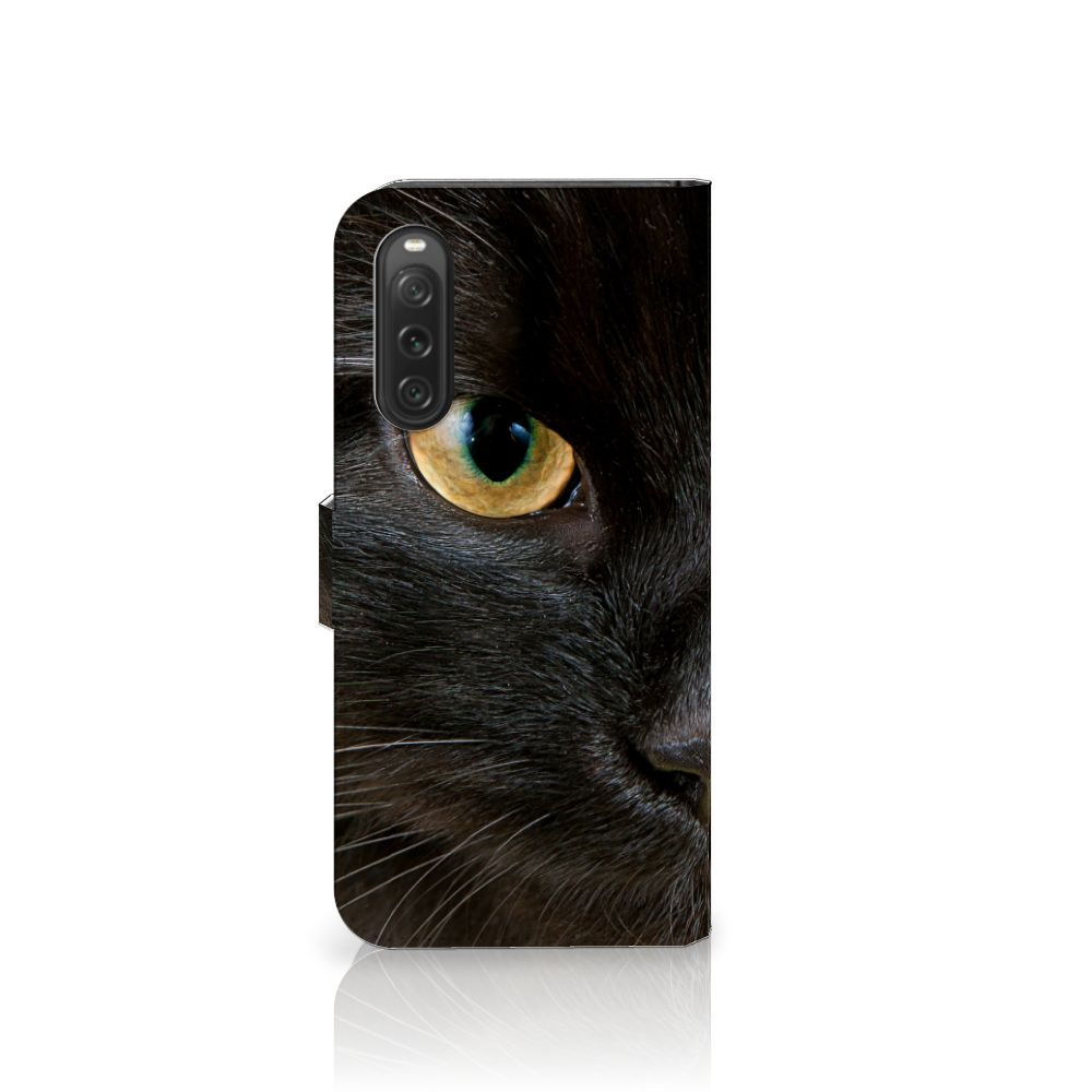 Sony Xperia 10 V Telefoonhoesje met Pasjes Zwarte Kat met een close-up van een zwarte kat