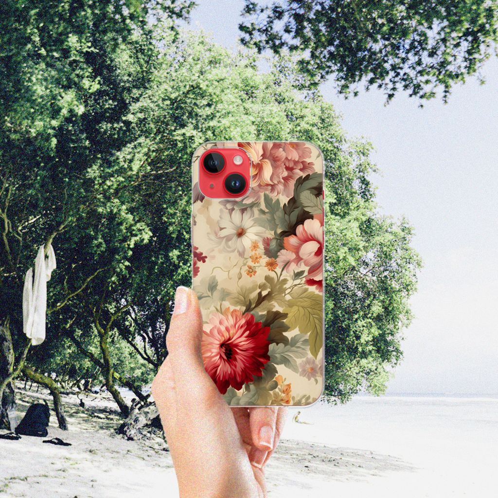 TPU Case voor iPhone 14 Plus Bloemen met kleurrijke bloemenprint in hand voor een mooie strandachtergrond.