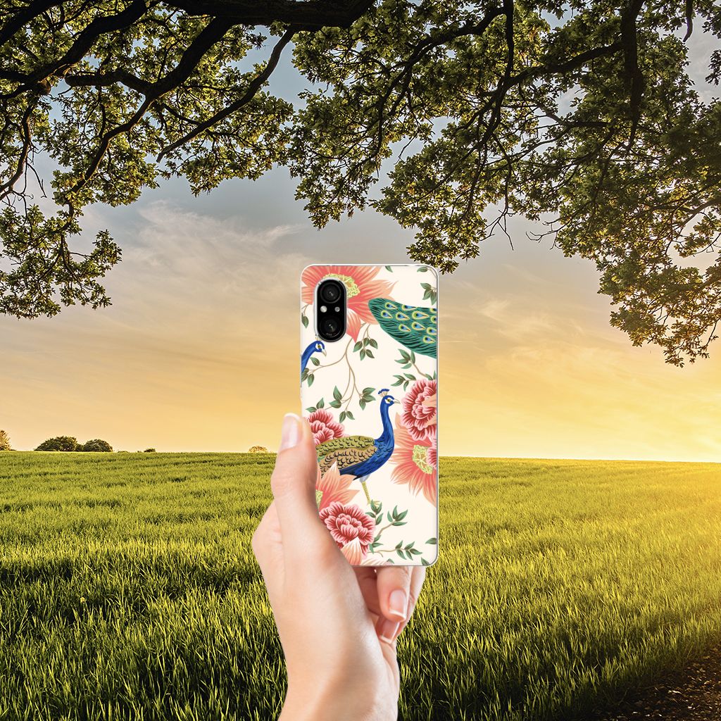 Sony Xperia 5 V TPU Hoesje Pink Peacock voorkant hand natuur