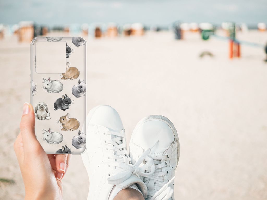 Xiaomi 13T TPU Hoesje voor Xiaomi 13T Konijntjes hand met telefooncassette strand