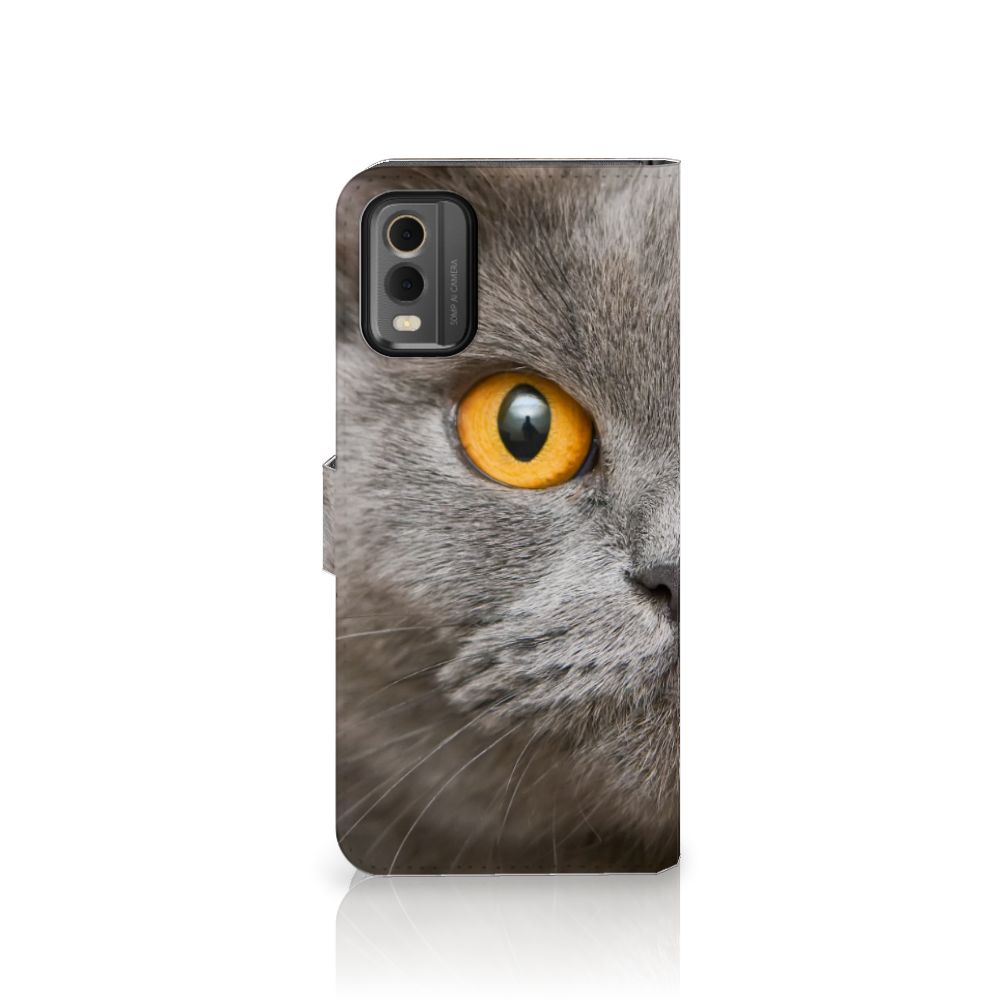 Telefoonhoesje met Pasjes Nokia C32 Britse Korthaar met een close-up van een grijze kat met een gele oog.
