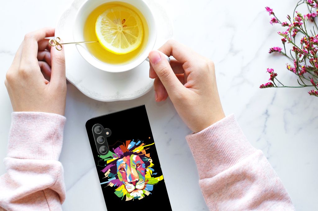 Samsung Galaxy A14 5G Magnet Case Lion Color showcased next to a cup of tea with lemon on a marble table.