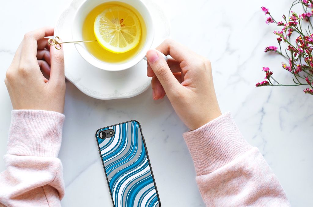 iPhone SE 2022 | SE 2020 | 7/8 Back Case Waves Blue beside a cup of tea with lemon, showcasing style and protection.