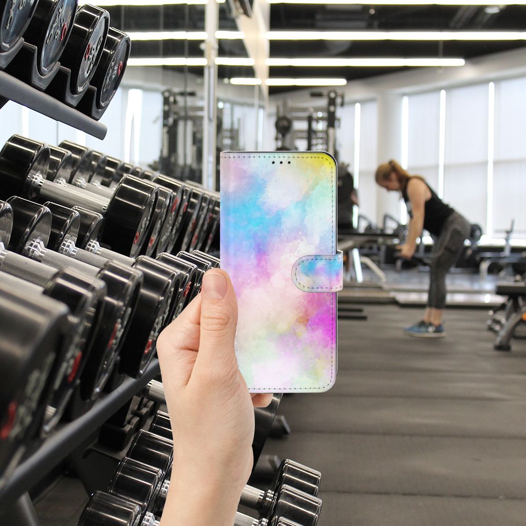 Hoesje OPPO Find X5 Pro Watercolor Light in a gym setting with weights and a person working out.