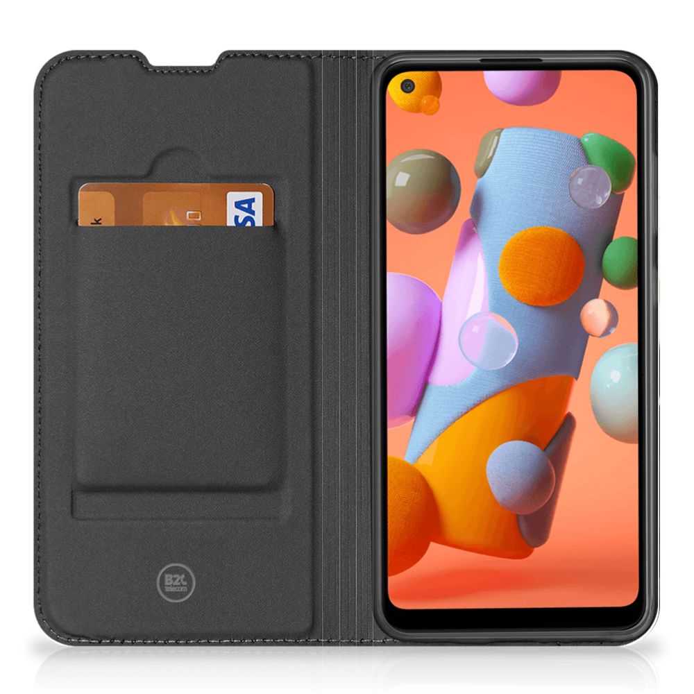 Samsung Galaxy M11 | A11 Hoesje maken Design Cowboy met zwart leren buitenkant en vak voor kaarten.