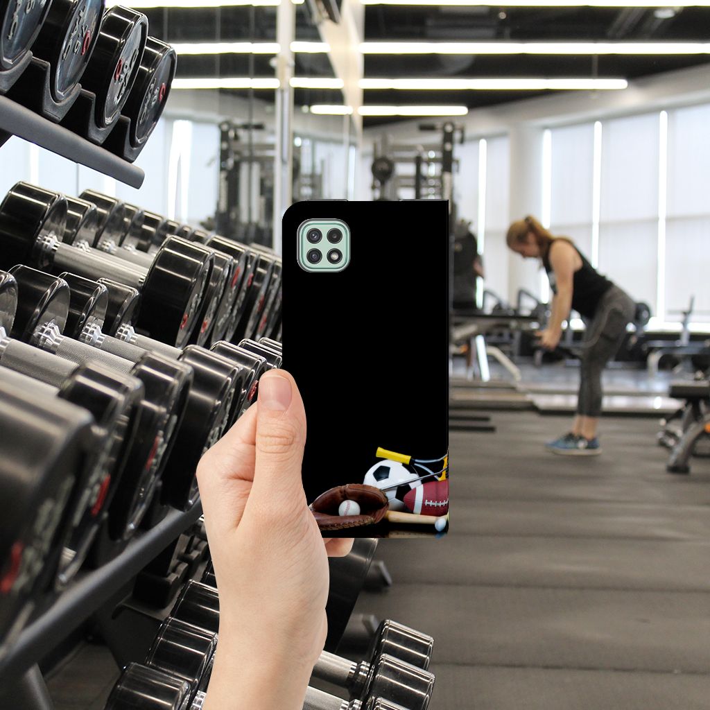Samsung Galaxy A22 5G Hippe Standcase Sports design with sports images in a gym setting.