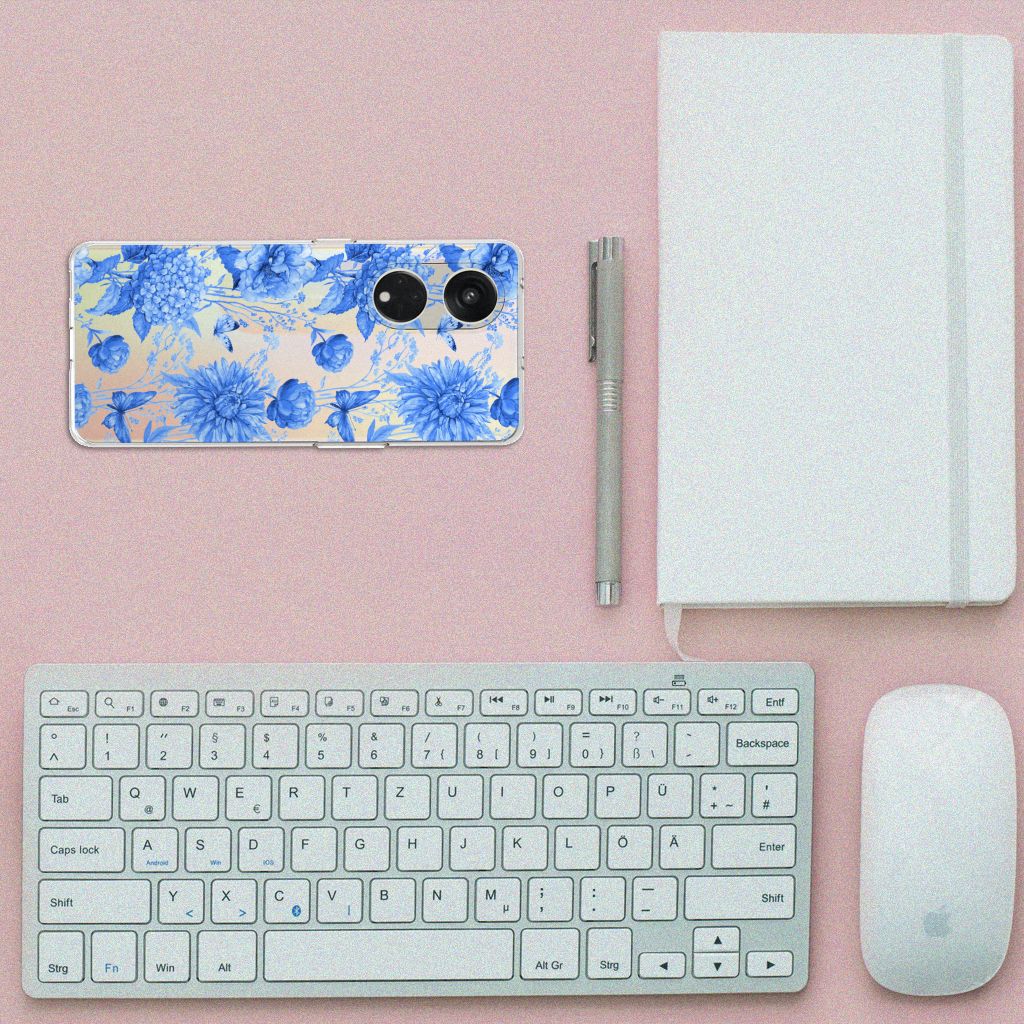 Bumper Hoesje voor iPhone 15 Pro Wooden Cubes met bloemenprint, uitzicht op een bureau met toetsenbord en notitieboek.