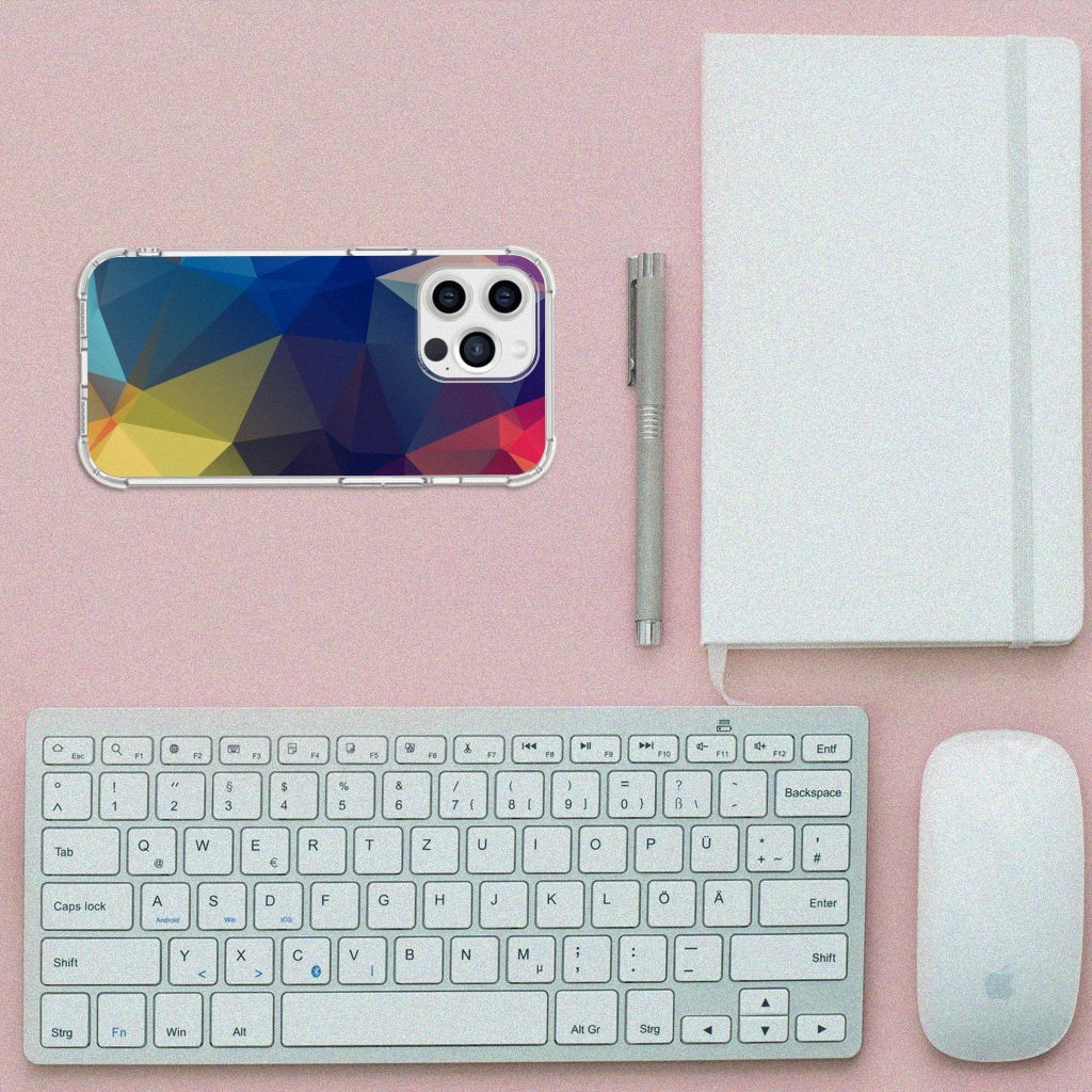 iPhone 13 Pro Max Shockproof Case Polygon Dark displayed on a desk with a keyboard and notebook.