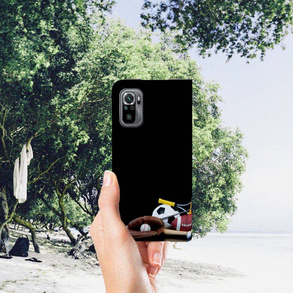 Xiaomi Redmi Note 10/10T 5G | Poco M3 Pro Hippe Standcase Sports with sports ball designs in hand at beach.