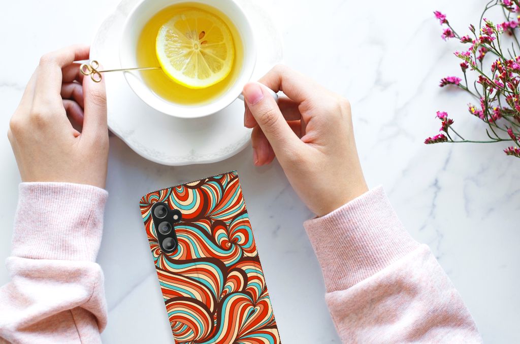 Samsung Galaxy A14 5G Bookcase Retro design with colorful retro patterns next to a tea cup.
