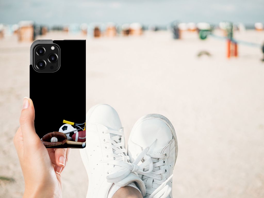 iPhone 13 Pro Hippe Standcase Sports with colorful sport prints held on a beach.