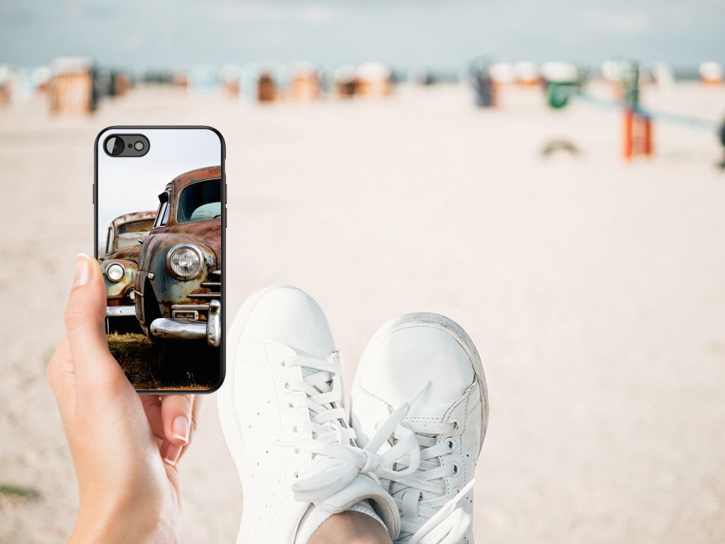 iPhone SE 2022 | SE 2020 | 7/8 Silicone Back Case Vintage Auto held by a person sitting on a beach.